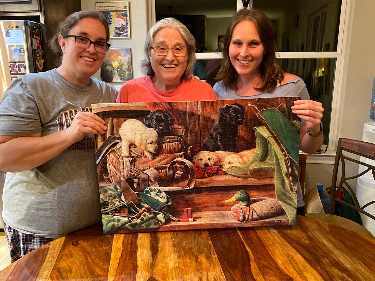 family with completed puzzle